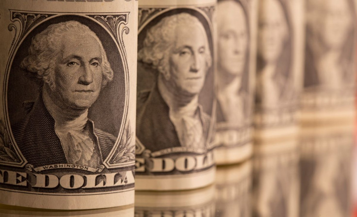 U.S. one dollar banknotes are seen in this illustration taken February 8, 2021.
