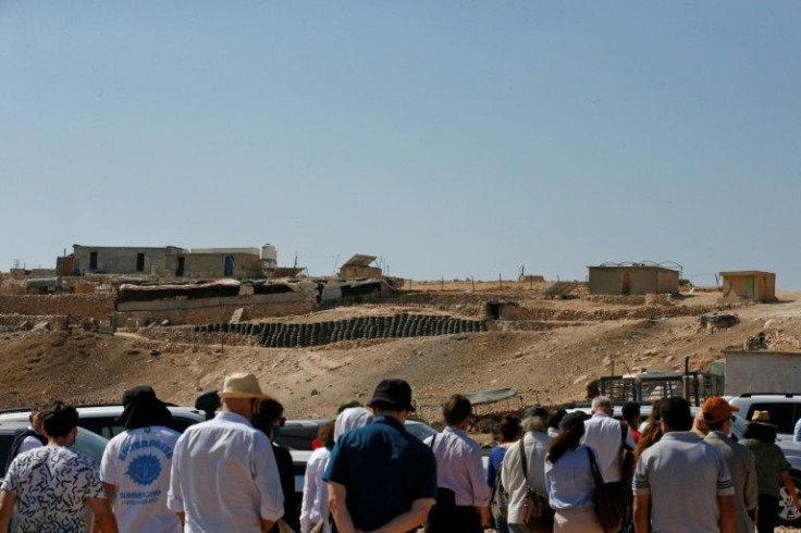 European Union officials and Israeli rights group representatives visit Palestinian communities in the Masafer Yatta area, in October 2020