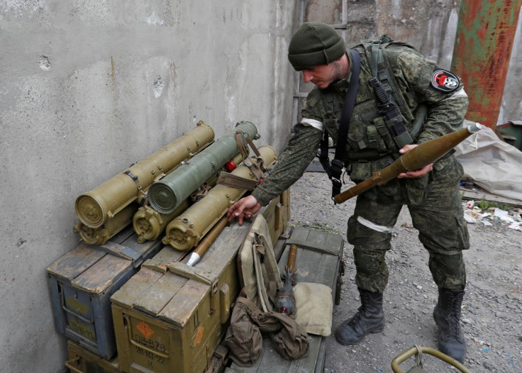 A service member of pro-Russian troops holds a rocket-propelled grenade at a fighting position near the Azovstal steel plant during Ukraine-Russia conflict in the southern port city of Mariupol, Ukraine May 5, 2022. Picture taken May 5, 2022. 