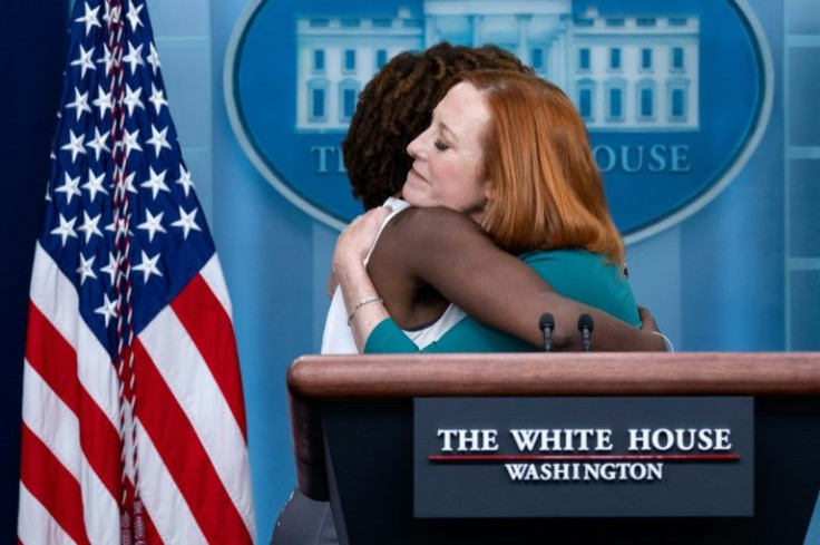 White House Press Secretary Jen Psaki (R) hugs her Principal Deputy Press Secretary Karine Jean-Pierre, who will replace Psaki as White House spokeswoman from May 13