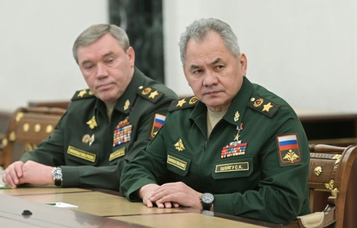 Russian Chief of the General Staff General Valery Gerasimov (L), pictured with Defence Minister Sergei Shoigu, was reportedly targeted by an unsuccessful Ukrainian strike last week as he visited the war-torn Donbas region
