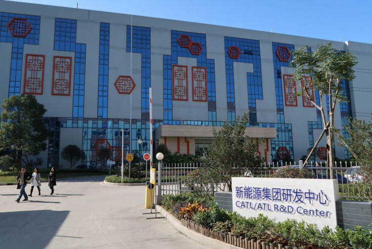 People walk past the R&D centre of Contemporary Amperex Technology Ltd (CATL) in Ningde, Fujian province, China, December 16, 2016. 