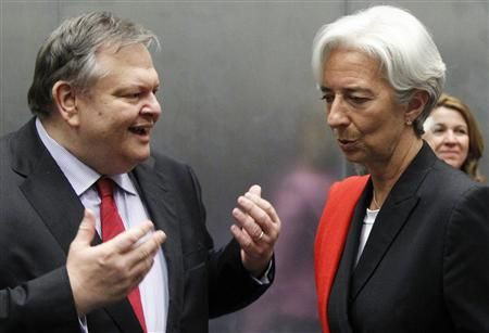 Greece's Finance Minister Venizelos talks to France's Finance Minister Lagarde during an eurozone finance ministers meeting in Luxembourg