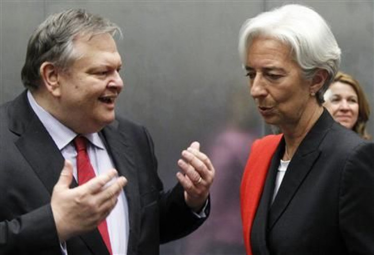 Greece&#039;s Finance Minister Venizelos talks to France&#039;s Finance Minister Lagarde during an eurozone finance ministers meeting in Luxembourg