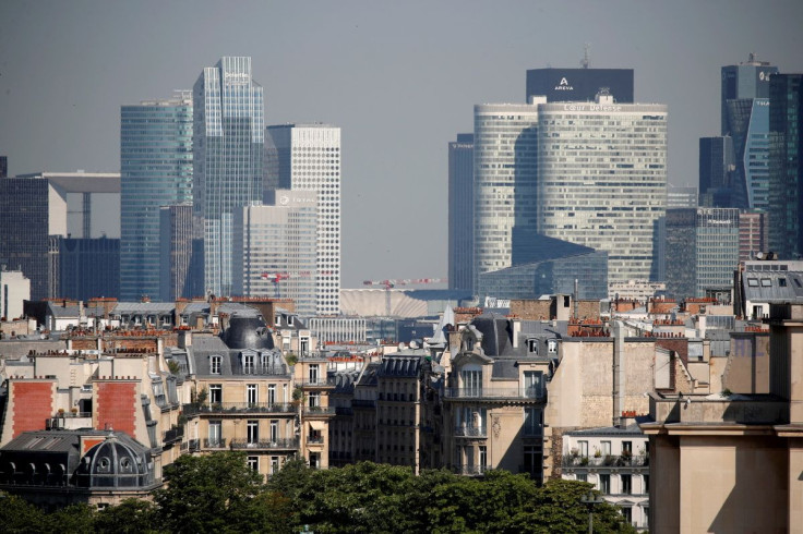 The skyline of La Defense business district is seen during a warm and sunny day as a heatwave combined with pollution led to circulation restrictions in Paris, France, June 25, 2020.