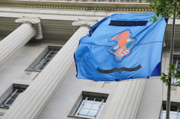 The flag and crest of the United States Department of Justice (DOJ) is seen at their headquarters in Washington, D.C., U.S., May 10, 2021. 