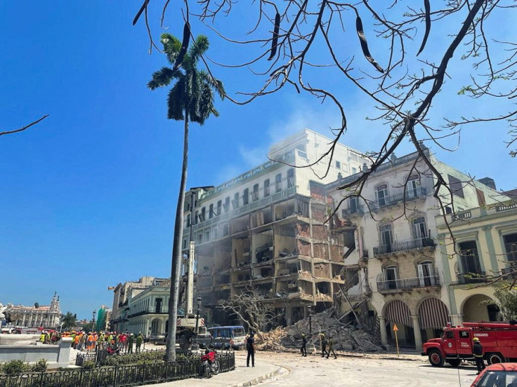 Rescue teams work at a site after an explosion destroyed the Hotel Saratoga, in Havana, Cuba May 6, 2022.