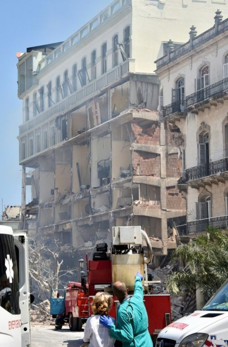 The facade of the Saratoga Hotel was torn off, exposing rooms inside