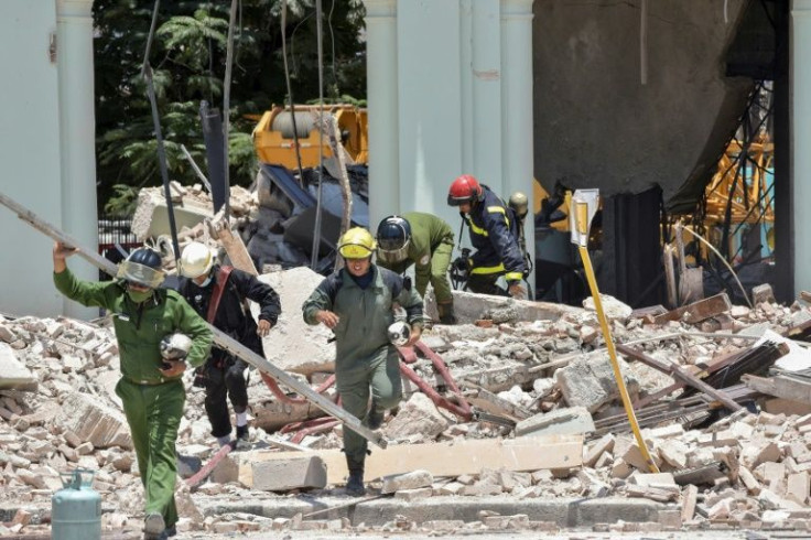 The blast tore off large parts of the facade, blew out windows, and destroyed cars parked outside the hotel