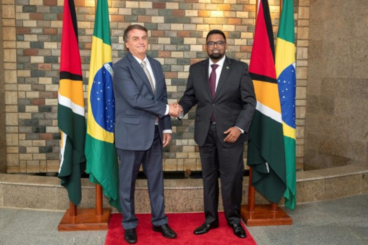 Brazil President Jair Bolsonaro (left) met with Guyana counterpart Irfaan Ali (right) to discuss energy cooperation