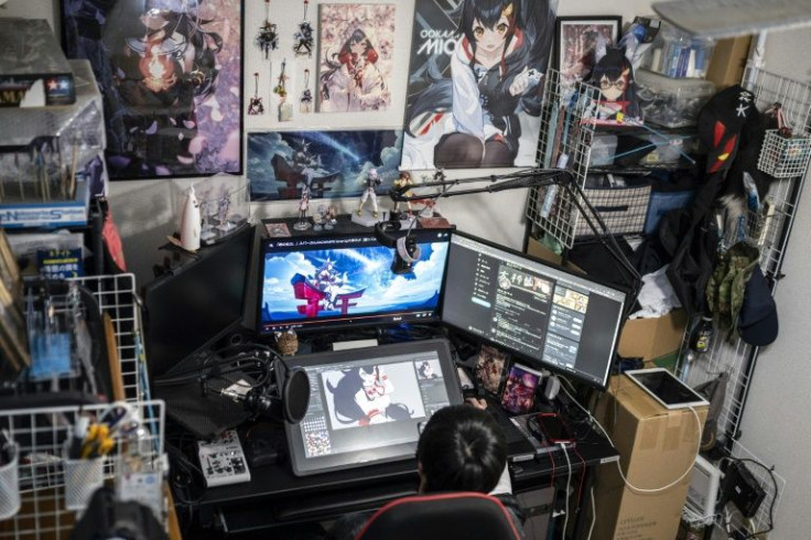 VTuber fan Kazumi has adorned his tiny apartment near Tokyo with posters, framed pictures and keyrings featuring his favourite character, Mio Ookami