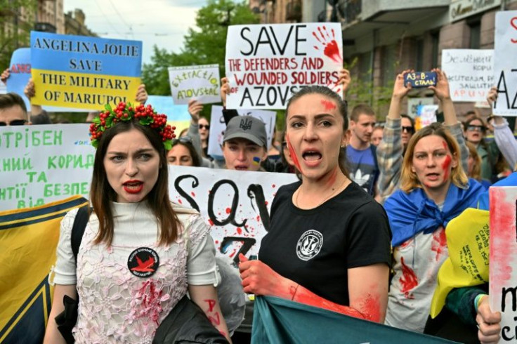 Relatives of Ukrainian troops holding out in the Azovstal plant rally in Kyiv on May 3, 2022