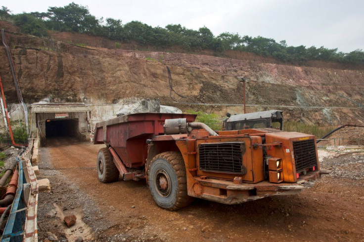 A truck exits the mine after collecting ore from 516 metres below the surface at the Chibuluma copper mine in the Zambian copperbelt region, January 17, 2015.