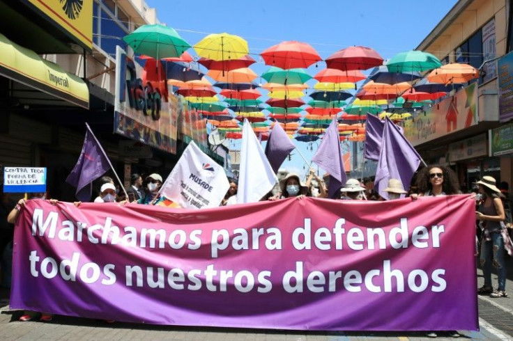 Dozens of women protested against gender-based violence and unequal pay