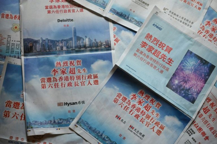 Western multinationals and local tycoons published newspaper adverts congratulating John Lee on becoming Hong Kong's next leader