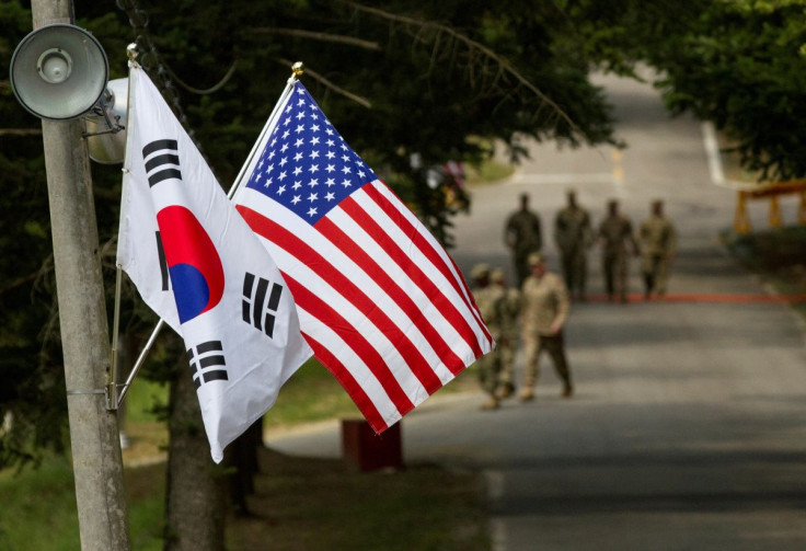 The South Korean and American flags fly next to each other at Yongin, South Korea, August 23, 2016. Picture taken on August 23, 2016.  Courtesy Ken Scar/U.S. Army/Handout via REUTERS   