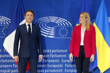 European Parliament president Roberta Metsola and France's President Emmanuel Macron pose at the EU Parliament in Strasbourg before attending the closing session of the Conference on the Future of Europe and the release of its report with proposals for re