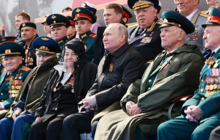 Russian President Vladimir Putin tells a Victory Day parade in Moscow that he had no choice but to send troops into Ukraine to defend the Russian "motherland" from an "absolutely unacceptable threat"