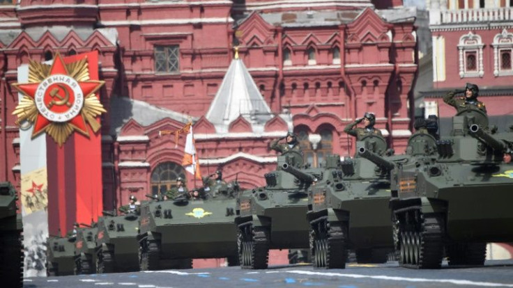 Columns of tanks and other military vehicles roll across Red Square for the annual Victory Day parade
