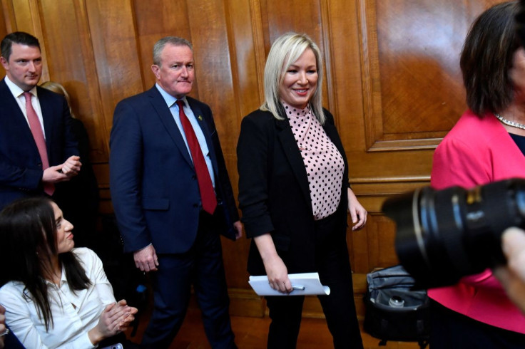 Sinn Fein deputy leader Michelle O'Neill arrives for a press conference with Finance Minister Conor Murphy and Sinn Fein MP John Finucane, at Stormont parliament buildings after a meeting with the Secretary of State for Northern Ireland to form a power-sh