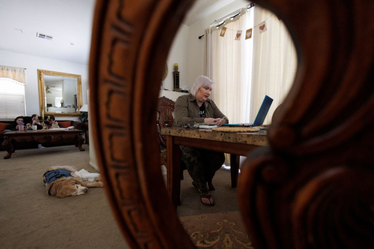 After convincing her mother and aunt to flee the Ukraine for Poland, Yuliya Day uses Facebook Messenger to video conference with her mother as she tries to figure a way to bring them to the United States from her home in Fullerton, California, U.S., April