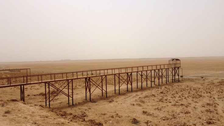 A view shows an area near the pond remaining of Lake Sawa, due to climate change-induced drought, in Samawa city, Iraq May 1, 2022. Picture taken May 1, 2022. Picture taken with a drone.