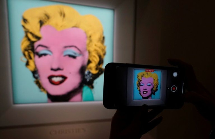 US artist Andy Warhol's 1964 portrait "Shot Sage Blue Marilyn" is sold at auction for a record $195 million at Christie's auction house in New York on May 9, 2022
