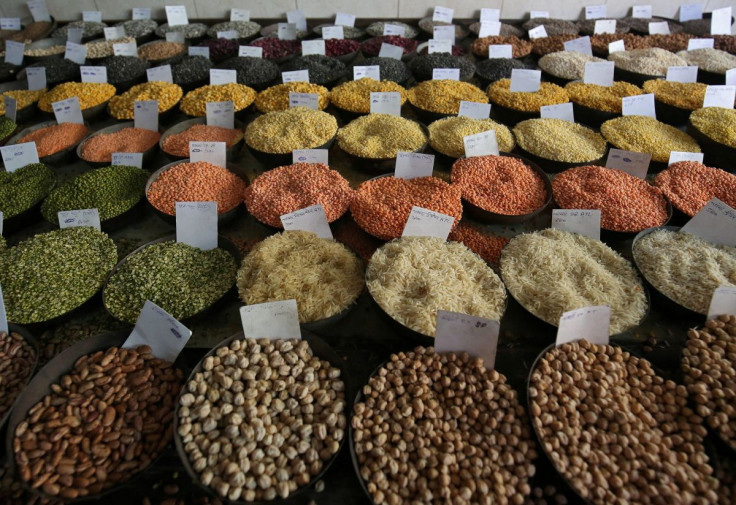 Price tags are seen on the samples of rice and lentils that are kept on display for sale at a wholesale market in the old quarters of Delhi, India, June 7, 2018. 