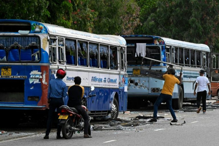 Sri Lankan anti-government protesters ransacked buses that had ferried government supporters to the capital Colombo on May 9, 2022