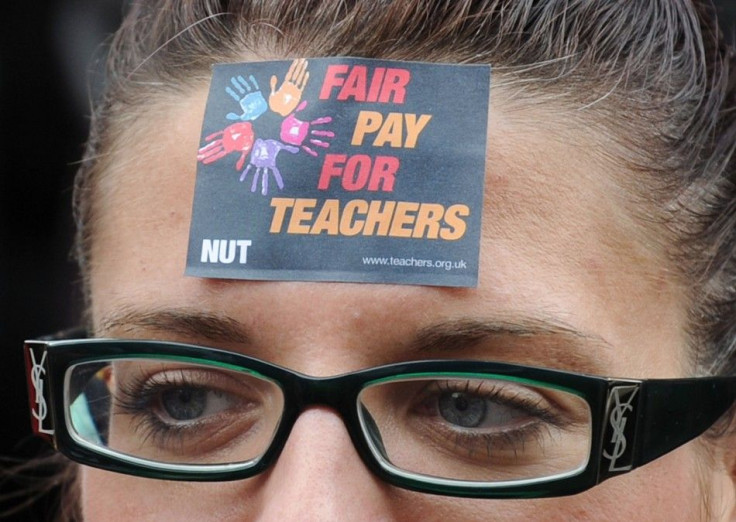 A protester marches during a teacher&#039;s protest rally in central London