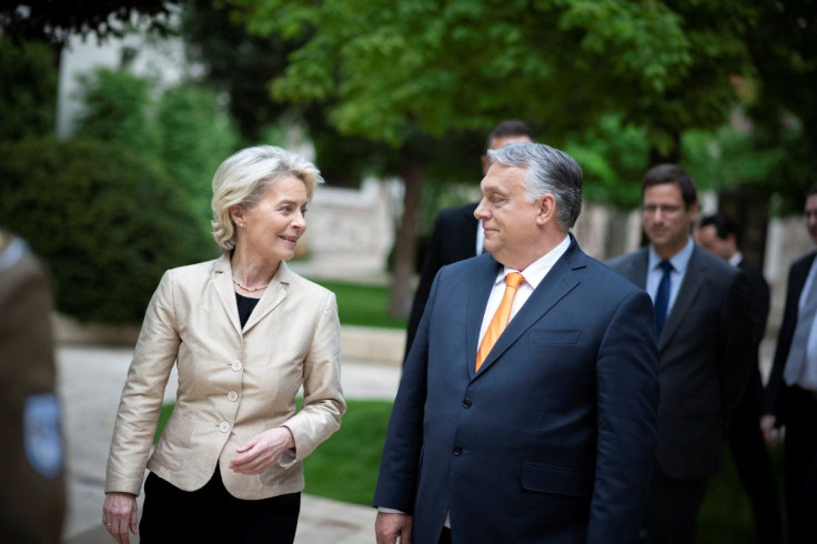 Hungary's Prime Minister Viktor Orban and European Commission President Ursula von der Leyen talk during their meeting in Budapest, Hungary, May 9, 2022. Hungarian Prime Minister's Press Office/Viven Cher Benko/Handout via REUTERS 