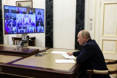 Russian President Vladimir Putin chairs a meeting with officials on fighting wildfires, via video link in Moscow, Russia May 10, 2022. Sputnik/Mikhail Metzel/Pool via REUTERS
