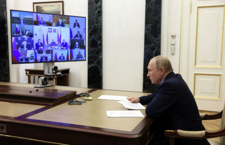 Russian President Vladimir Putin chairs a meeting with officials on fighting wildfires, via video link in Moscow, Russia May 10, 2022. Sputnik/Mikhail Metzel/Pool via REUTERS