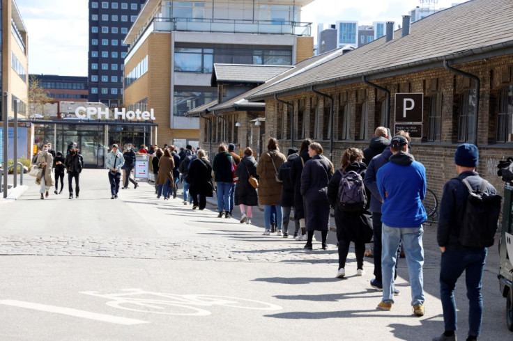 People wait in line at a free coronavirus disease (COVID-19) antigen test centre, where getting to the front of the line took about an hour and a half, in central Copenhagen, Denmark, April 23, 2021.