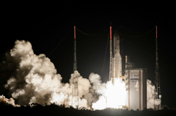 An Ariane 5 rocket lifts off in 2017 from French Guiana with a satellite of Viasat, one of whose networks was allegedly hacked by Russia during the invasion of Ukraine