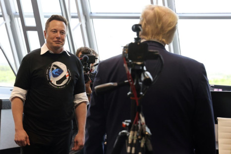 U.S. President Donald Trump and Elon Musk are seen at the Firing Room Four after the launch of a SpaceX Falcon 9 rocket and Crew Dragon spacecraft on NASA's SpaceX Demo-2 mission to the International Space Station from NASA's Kennedy Space Center in Cape 