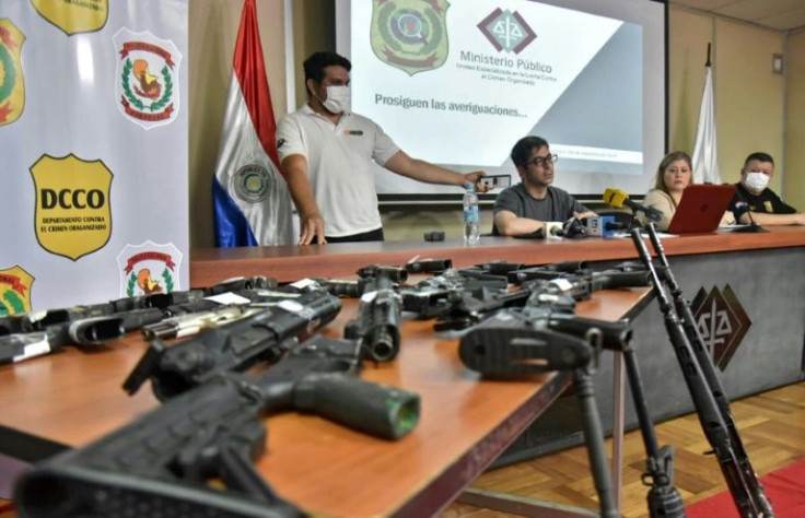 Paraguayan anti-drug prosecutor Marcelo Pecci (3-R) is seen here in Asuncion in November 2021; he had specialized in organized crime, drug trafficking, money laundering and the financing of terrorism