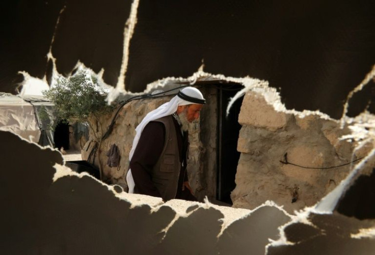 Ali Mohammed Jabbareen, 60, walks at the Palestinian village of Jinba, part of the Masafer Yatta area in the Israeli-occupied West Bank