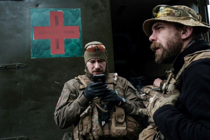 Volunteer medics Andriy Kukhar and Yuriy Kozhumyaka admit they are unable to save many of the soldiers they help extract from the battlefield