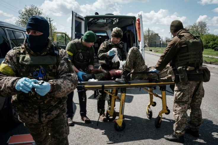 Volunteer medics play a major role in helping extract injured Ukrainian soldiers from the front