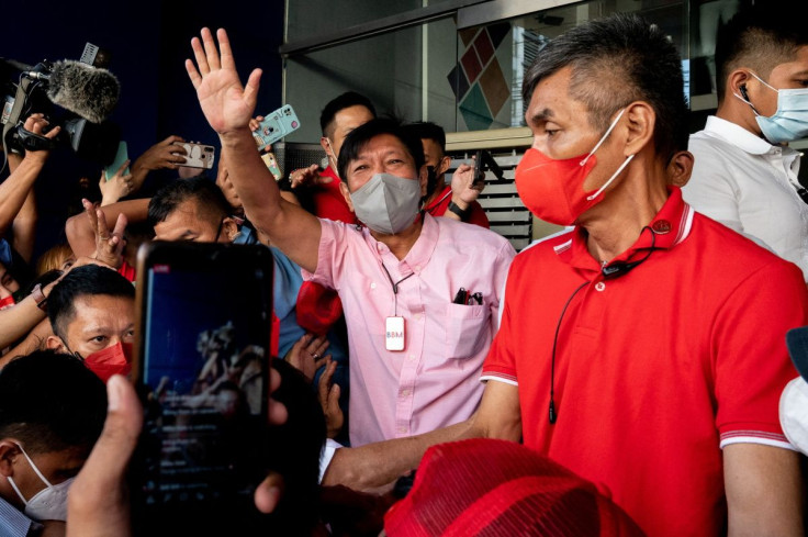 Philippine presidential candidate Ferdinand "Bongbong" Marcos Jr., son of late dictator Ferdinand Marcos, greets his supporters at his headquarters in Mandaluyong City, Metro Manila, Philippines, May 11, 2022.