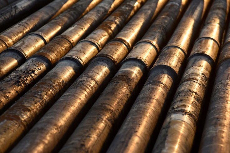 Steel drill pipe is seen at sunrise on an oil lease owned by Parsley Energy in the Permian Basin near Midland, Texas U.S. August 24, 2018. Picture taken August 24, 2018. 