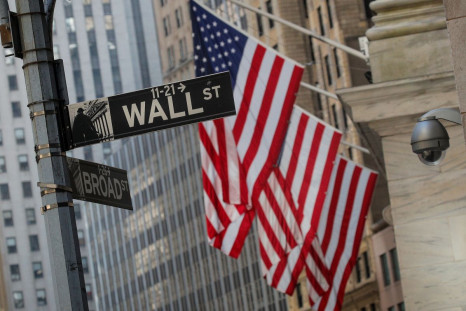 A Wall St. sign is seen outside the New York Stock Exchange (NYSE) in the financial district in New York City, U.S., March 2, 2020. 