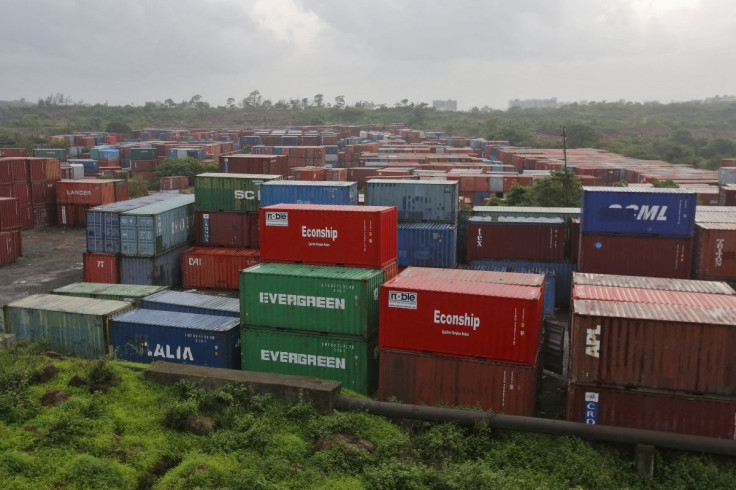 Cargo containers are seen stacked outside the container terminal of Jawaharlal Nehru Port Trust (JNPT) in Mumbai, India, July 15, 2015.  