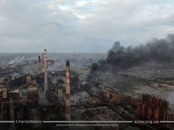 A view shows smoke rising at Azovstal Iron and Steel Works in Mariupol, Ukraine, in this handout picture obtained by Reuters on May 11, 2022. Azov Regiment/Handout via REUTERS