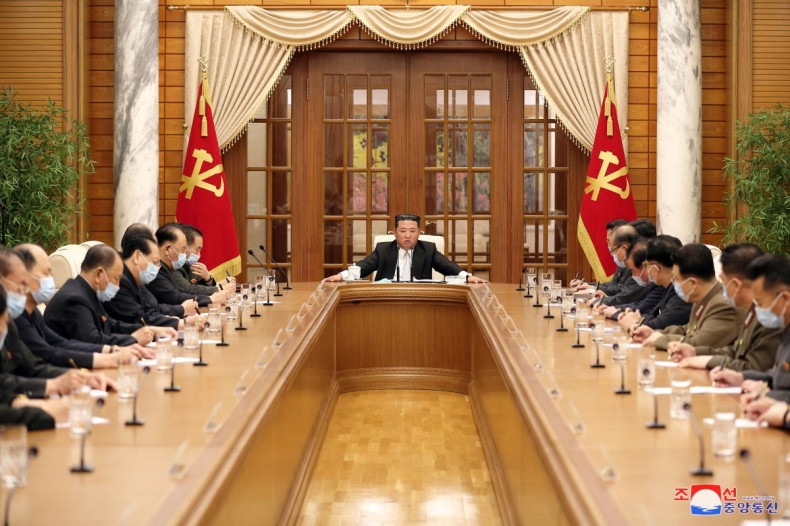 North Korean leader Kim Jong Un chairs a Worker's Party meeting on coronavirus disease (COVID-19) outbreak response in this undated photo released by North Korea's Korean Central News Agency (KCNA) on May 12, 2022.  KCNA via REUTERS 