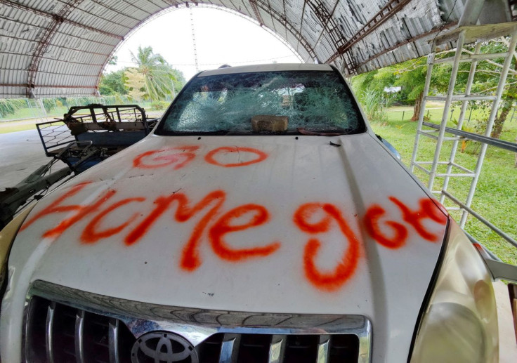Graffiti written by anti-government factions is pictured on a vehicle, at a house belonging to the former Prime Minister Mahinda Rajapaksa's family, following violent clashes between pro and anti-government factions and police, in Weeraketiya, Sri Lanka,