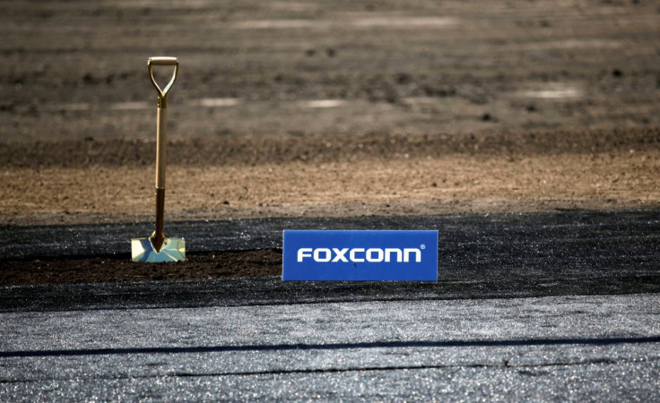A shovel and FoxConn logo are seen before the arrival of U.S. President Donald Trump as he participates in the Foxconn Technology Group groundbreaking ceremony for its LCD manufacturing campus, in Mount Pleasant, Wisconsin, U.S., June 28, 2018.