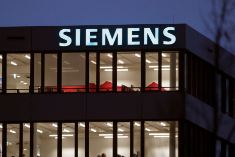The logo of German industrial group Siemens is seen at an office building in Zug, Switzerland December 1, 2021. 