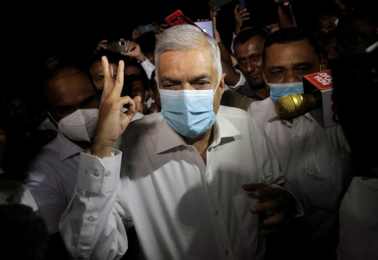 Ranil Wickremesinghe, newly appointed prime minister, arrives at a Buddhist temple after his swearing-in ceremony, amid the country's economic crisis, in Colombo, Sri Lanka, May 12, 2022. 